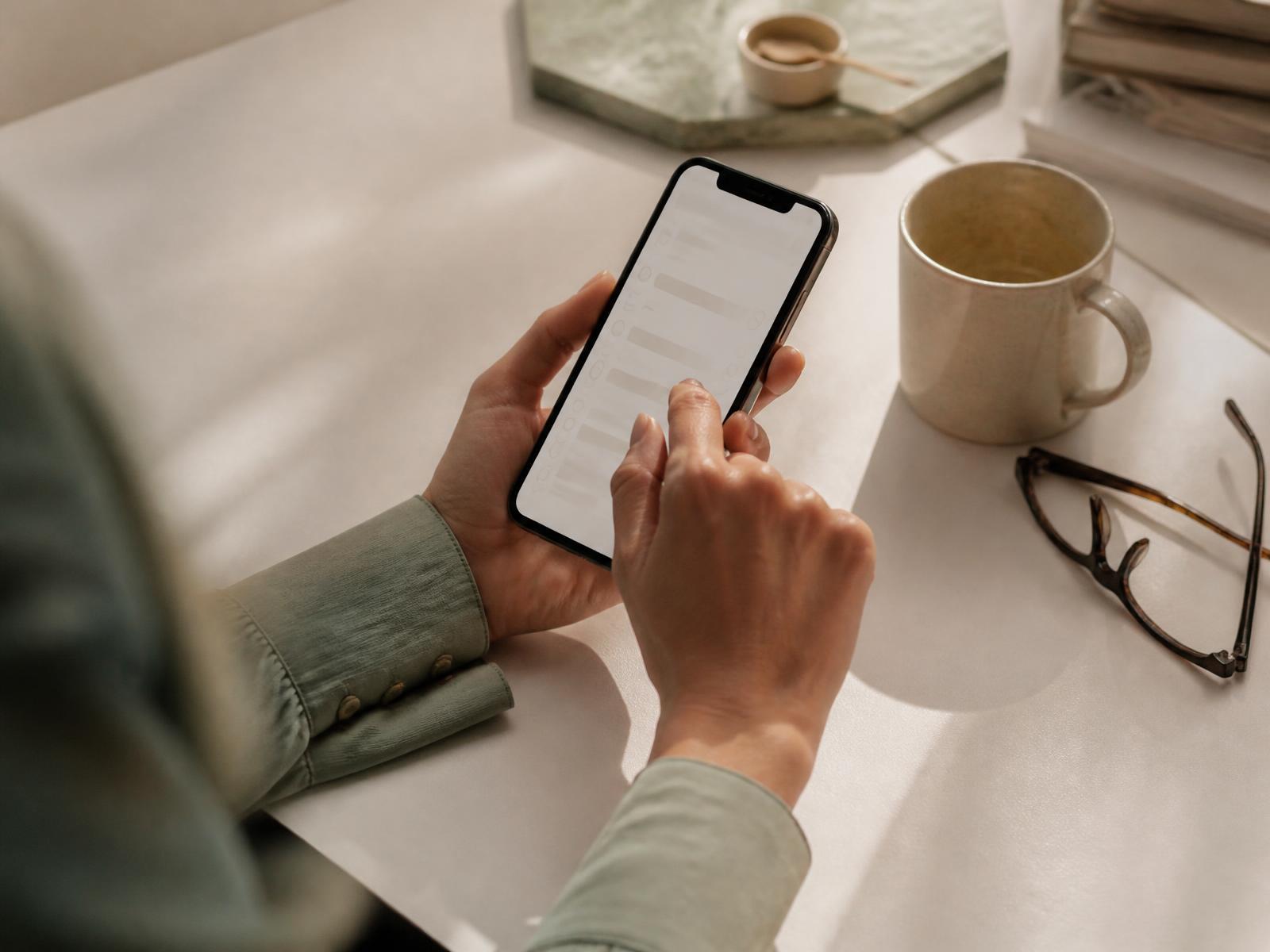 Person completing a secure online health questionnaire on a smartphone
